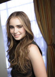 Lily Collins - "Priest" press conference portraits by Armando Gallo (Beverly Hills, May 1, 2011) - 28xHQ XtiGP1jB